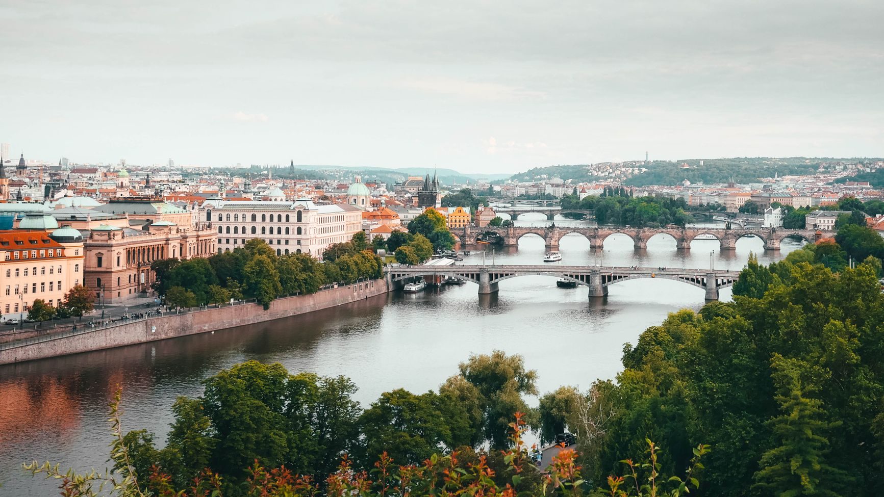 bridges above river in cityscape